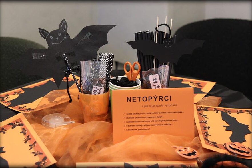 Craft table with paper bats at a children’s workshop